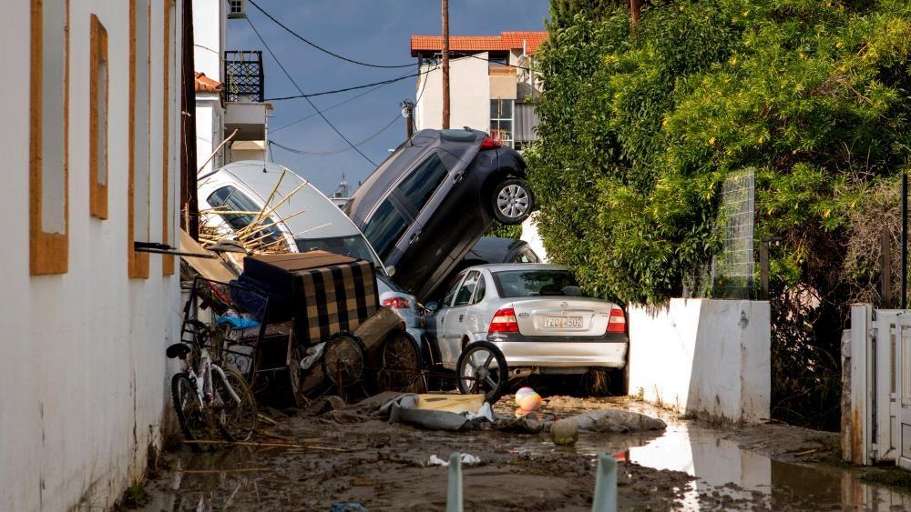Cars piled up on small, muddy road, following floods caused by storm Bora in the area of Lalysos, on the island of Rhodes, Greece, 1 December 2024.