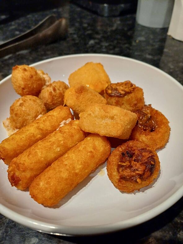 The bacon mac and cheese bites, the hash brown dogs, the battered grilled cheese mini toasted sandwiches and the hunters chicken