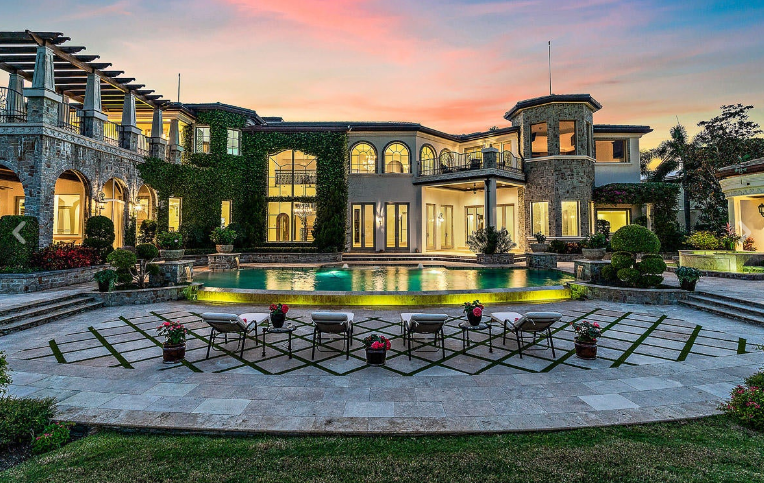 Donald Trump Jr. and girlfriend, Kimberly Guilfoyle, just paid $9.7 million for this house in Jupiter's Admirals Cove community