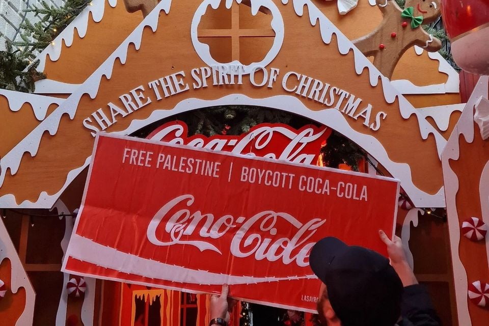 Belfast Christmas Coca-Cola display is protested by Palestine activists