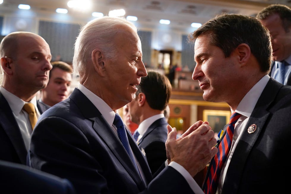 Feb 7, 2023; Washington, DC, USA; President Joe Biden talks with Rep. Seth Moulton, D-Mass., after the State of the Union address to a joint session of Congress at the Capitol, Tuesday, Feb. 7, 2023, in Washington. Mandatory Credit: Jacquelyn Martin/Pool-USA TODAY NETWORK