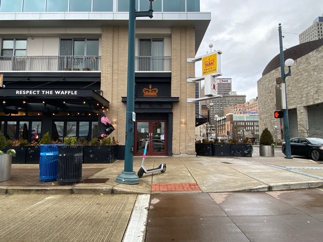 A car crashed into the Taste of Belgium on West Freedom Way on Sunday, according to Cincinnati police.