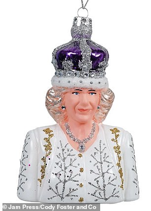 For Camilla, Queen Consort, the figurine dons a purple crown, a Christmas-themed white dress and a shining diamond necklace