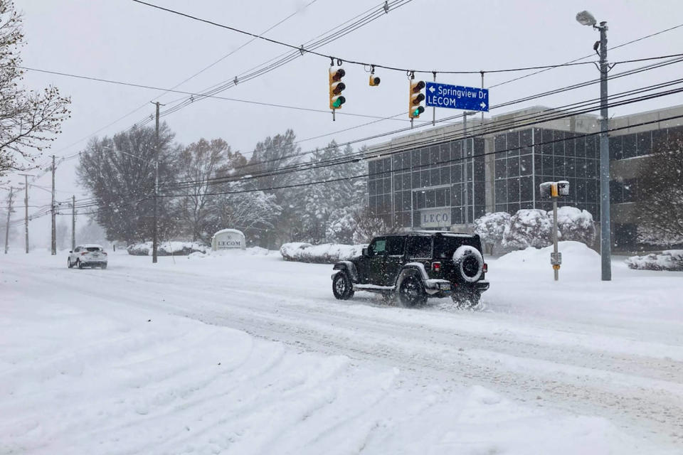 A jeep on a snowy road (A.J. Rao / Erie Times-News via USA Today Network)