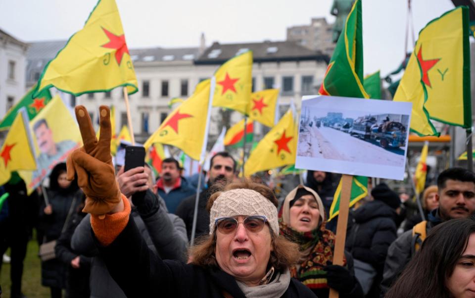 Supporters of the Kurdish-led groups staged a protest outside the European Parliament in Brussels on Wednesday, demanding that the international community protect the Kurds in Syria
