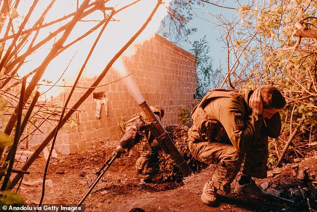 120 mm mortar crew fires shells at Russian positions as the war between Russia and Ukraine continues in Chasiv Yar, Ukraine on April 27, 2024