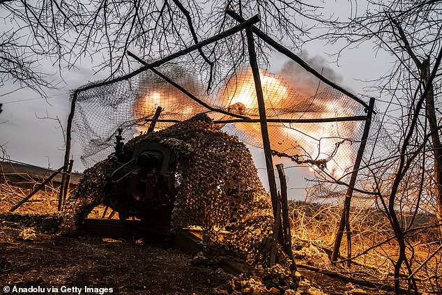 Ukrainian soldiers at the artillery position in an unidentified area on the Adiivka frontline prepare to fire the D 30 gun as the war between Russia and Ukraine continues in Adiivka, Donetsk Oblast, Ukraine on March 13, 2024