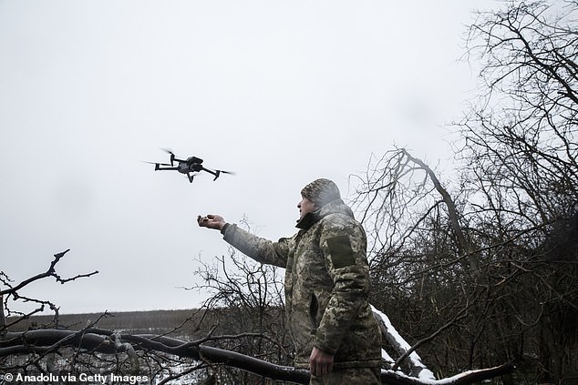 A Ukrainian soldier is placed in trenches retaken from the Russian army on the Vuhledar front line as the war between Russia and Ukraine continues in Donetsk Oblast, Ukraine