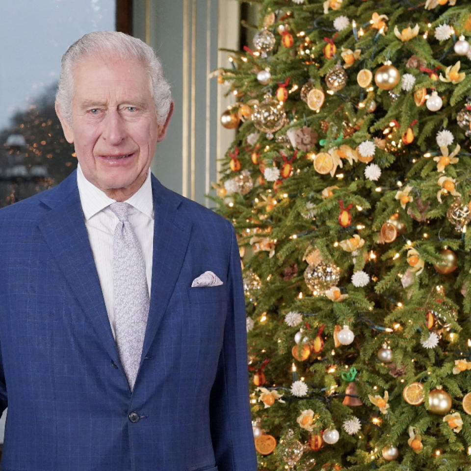 Kate Middleton wears a long red coat as she attends the Christmas Carol concert and King Charles smiles next to a Christmas tree in Buckingham Palace.