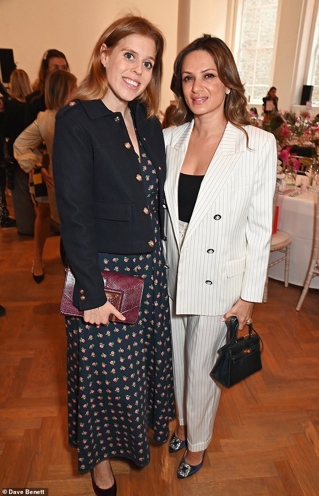The royal, 36, was all smiles as she attended The cat the Royal Academy of Arts on Tuesday. Pictured with Anu Hinduja