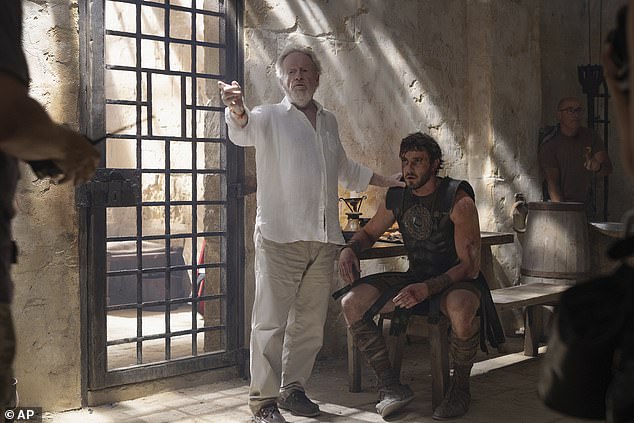 Director Ridley Scott, centre, working with Paul Mescal on the set of Gladiator 2