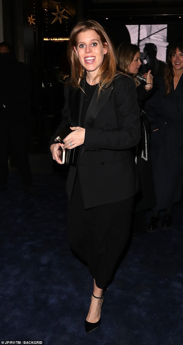 Princes Beatrice (pictured), 36, cut a stylish figure in a tuxedo jacket complete with satin lapels