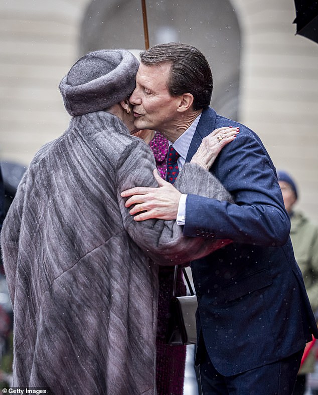 Queen Margrethe of Denmark (L) greets Prince Joachim of Denmark in January this year