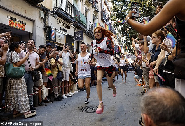 Participants compete in the High-Heels Race as part of the Pride celebrations, in the Chueca neighbourhood in Madrid on July 4 29, 2024
