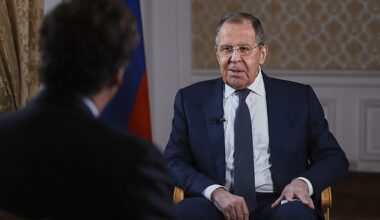 Russia's Foreign Minister Sergey Lavrov, speaks during an interview with former Fox News host Tucker Carlson, back to a camera, in Moscow, Russia on Tuesday, Dec. 3, 2024