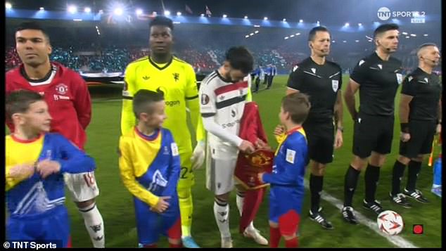 Bruno Fernandes made sure that his mascot was guarded from the freezing temperatures