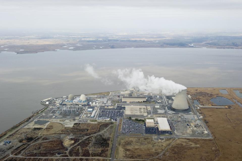 An aerial view of the Salem Nuclear Power Plant (L, two domes) and Hope Creek Nuclear Generating Station (C, dome behind rectangular building) March 22, 2011, situated on the Delaware River in Lower Alloways Township, New Jersey. Salem is a dual unit pressurized water reactor and Hope Creek a single unit boiling water reactor. AFP PHOTO/Stan HONDA (Photo credit should read STAN HONDA/AFP via Getty Images)