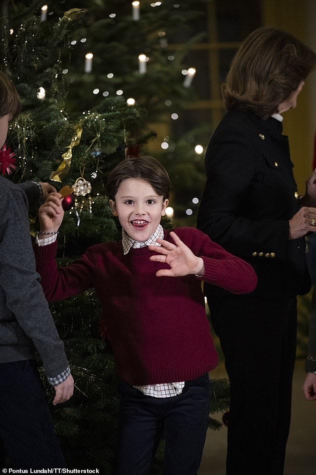 Prince Alexander, the son of Prince Carl Philip and Princess Sofia, looked in high spirits as he gave the camera a cheeky smile and wave