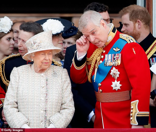 Queen Elizabeth II and Prince Andrew, Duke of York watch a flypast from the balcony of Buckingham Palace during Trooping The Colour, the Queen's annual birthday parade, on June 8, 2019 in London