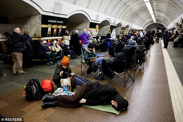 People take shelter at a metro station during an air raid alert, amid Russia's attack on Ukraine, in Kyiv, Ukraine, December 25, 2024