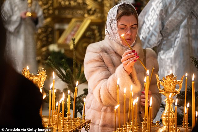 Kyiv residents attend Christmas service in St. Michael's Golden-Domed Monastery in Kyiv, Ukraine on December 24, 2024