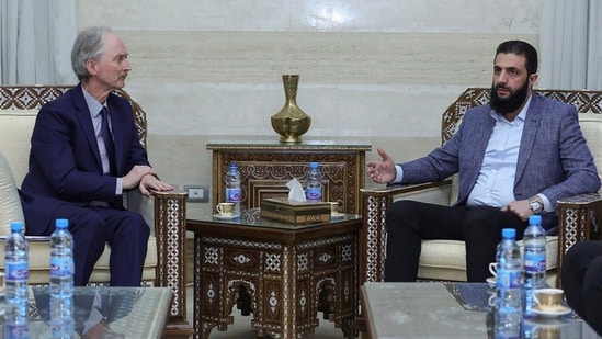 The leader of Hayat Tahrir al-Sham Ahmad al-Sharaa, (Abu Mohammed al-Golani), right, as he meets with United Nations' special envoy to Syria, Geir Pederson, in Damascus, Monday, Dec. 16, 2024. AP/PTI(AP12_16_2024_000257A)(AP)