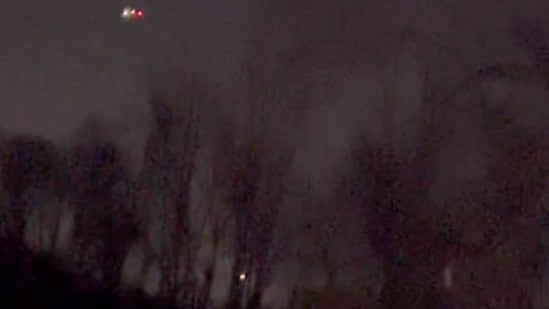 In this image taken from a video, what appears to be drones can be seen flying over Randolph, N.J., on Dec. 4, 2024. (MartyA45_ /TMX via AP)(AP)