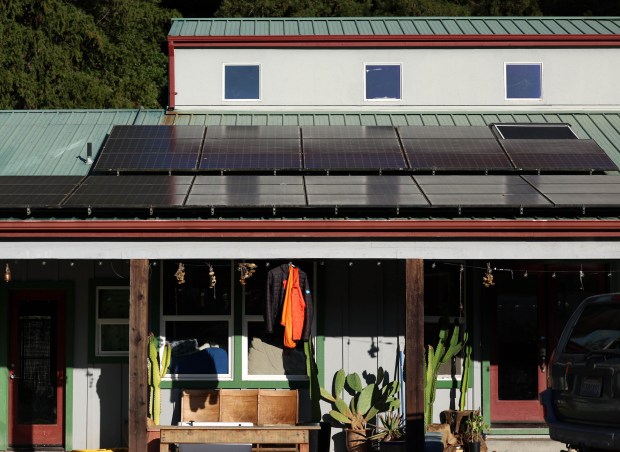 Roof solar panels installed at the home of Solar Punk...
