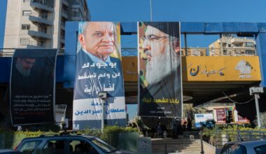 The photos on these banners in a Beirut suburb say a lot about the governance of Lebanon. On the left is the speaker of Parliament, Nabih Berri. On the right is Hassan Nasrallah, who was killed by an Israeli strike on Sept. 27. Lebanon hasn’t had a president for two years because Hezbollah keeps blocking candidates.