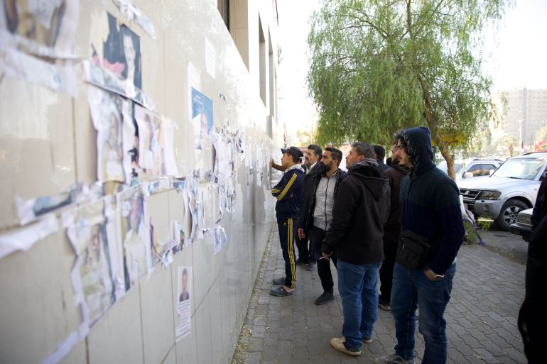 At a hospital in Damascus, Syrians look for their disappeared [Ali Haj Suleiman/Al Jazeera]