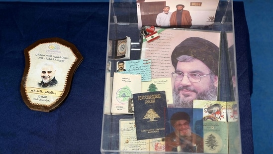 FILE PHOTO: Documents, letters and photographs the Israeli army says belonged to the Lebanese militant group Hezbollah, and were seized by the army during its ground operation in south Lebanon, are displayed to the media on December 23, 2024, in a northern Israeli military base.(AFP)