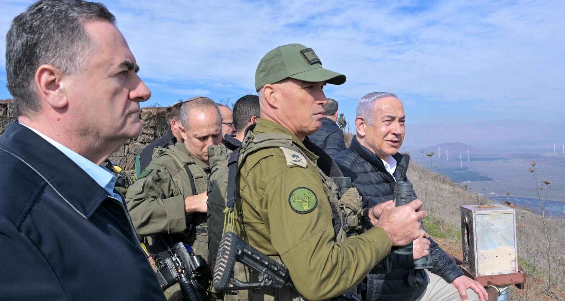 Israeli Prime Minister Benjamin Netanyahu (right) and other Israeli officials at the Syrian border on Dec. 8, 2024. (Koby Gideon/Israeli Government Press Office)