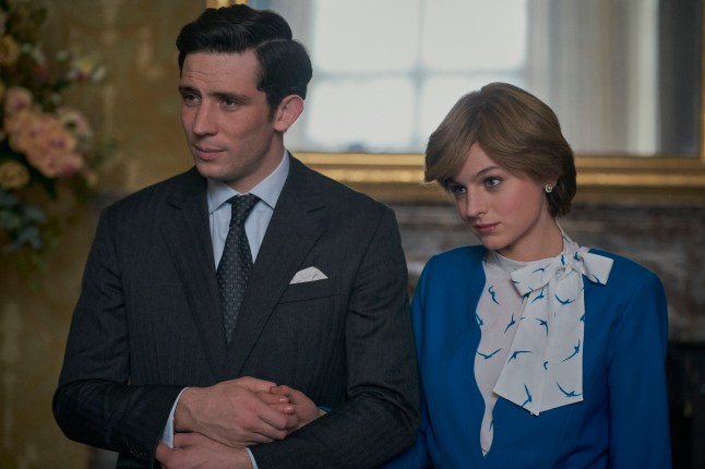 This image released by Netflix shows Josh O'Connor, left, and Emma Corrin in a scene from "The Crown." O'Connor and Corrin are considered frontrunners for Emmy awards for lead actor and actress in a drama series for their portrayals of ill-fated royal mates Charles and Diana. (Des Willie/Netflix via AP)