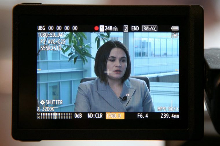 Sviatlana Tsikhanouskaya, the exiled opposition Belarus leader who ran against President Alexander Lukashenko in the 2020 election, appears on a screen as she speaks to Reuters ahead of Belarus' 2025 election in Ottawa, Ontario, Canada November 26, 2024. REUTERS/Kyaw Soe Oo