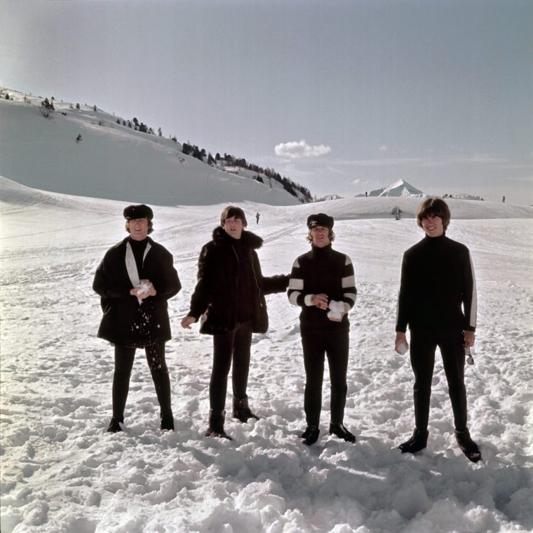 OBERTAUERN AUSTRIA - MARCH 1965: The Beatles (L-R) John Lennon, Paul McCartney, Ringo Starr and George Harrison pose for a photo in the snow in March 1965 in Obertauern, Austria during a break from filming their second movie HELP!. (Photo by Michael Ochs Archive/Getty Images)