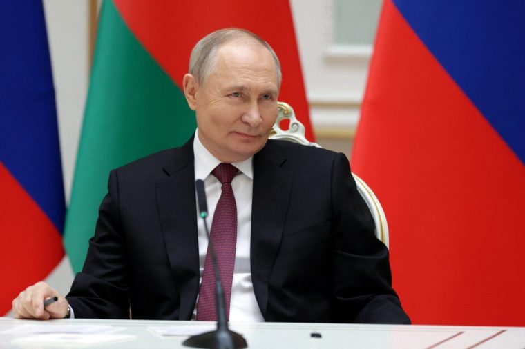 Russia's President Vladimir Putin takes part in a signing ceremony following a meeting of the Supreme State Council of the Union State of Russia and Belarus in Minsk, Belarus December 6, 2024. Sputnik/Gavriil Grigorov/Pool via REUTERS ATTENTION EDITORS - THIS IMAGE WAS PROVIDED BY A THIRD PARTY.