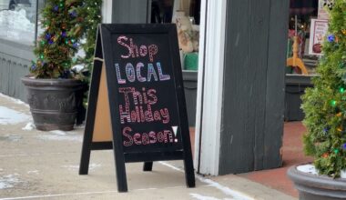 A sign outside of a business in downtown Sturgeon Bay.