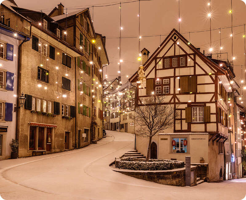 Switzerland’s Festive Christmas Cities: Winter Magic Unveiled for Travelers with Heartwarming Journeys, Funi Fondue Adventures, Historic Railcar Excursions, and St. Gallen Tours