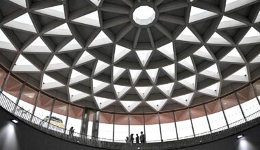 Best photos of December 22: Vietnam's lotus-shaped skylight to Romania's 'The March of Heroes'