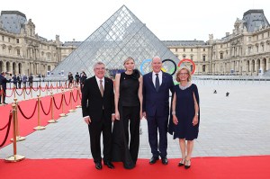 PARIS, FRANCE - JULY 25: IOC President Thomas Bach, Princess of Monaco Charlene, Prince of Monaco Albert II, and Claudia Bach, wife of Thomas Bach attend the IOC & Elysee Dinner at the Louvre ahead of the Paris 2024 Olympic Opening Ceremony on July 25, 2024 in Paris, France. (Photo by Arturo Holmes/Getty Images)