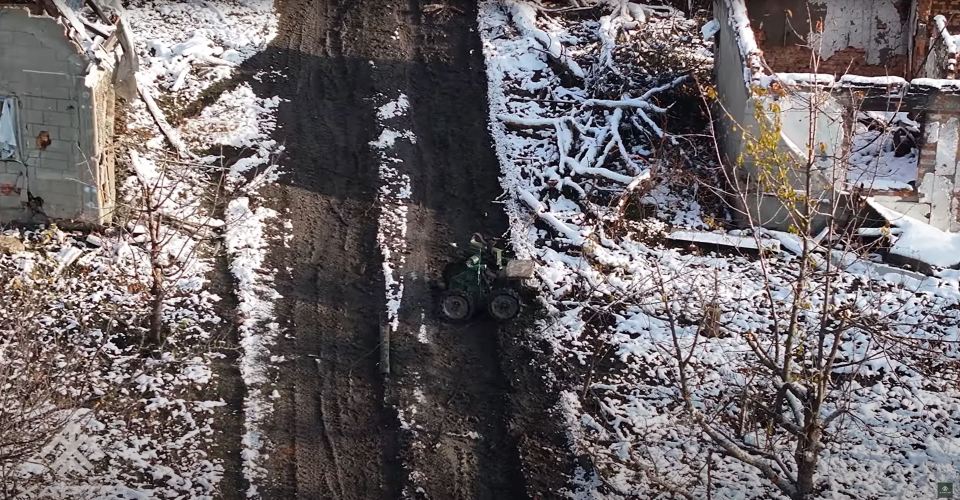 The robots drive through snow and mud on the frontline of the war