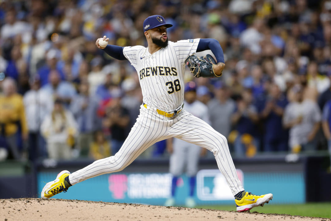 MILWAUKEE, WISCONSIN - OCTOBER 03: Devin Williams #38 of the Milwaukee Brewers pitches in the ninth inning against the New York Mets during Game Three of the Wild Card Series at American Family Field on October 03, 2024 in Milwaukee, Wisconsin. (Photo by John Fisher/Getty Images)