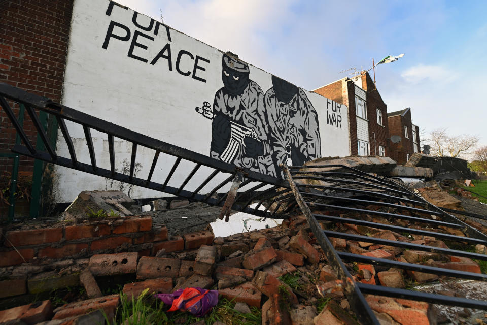BELFAST, NORTHERN IRELAND - DECEMBER 7: A loyalist paramilitary mural is pictured damaged following high winds on December 7, 2024 in Belfast, Northern Ireland. Storm Darragh is the fourth named storm of this season and is expected to bring gusts of wind up to 80mph and heavy rain through the weekend. (Photo by Charles McQuillan/Getty Images)