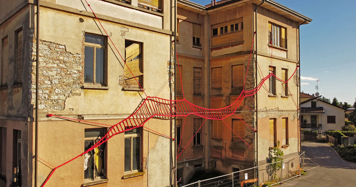 la cura threaded installation by ECO weaves across elementary school in italy