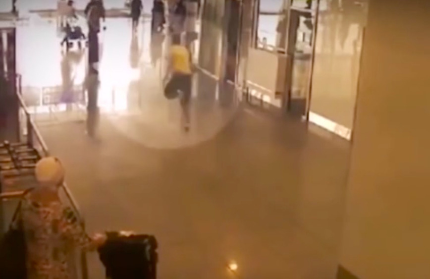 The tourist was seen sprinting out of the airport in a panic moments after speaking to an airport doctor