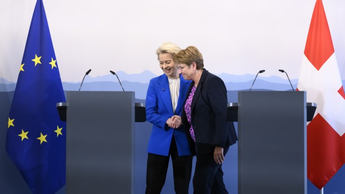 European Commission President Ursula von der Leyen, left, and Swiss President Viola Amherd shake hands during a press conference in Bern