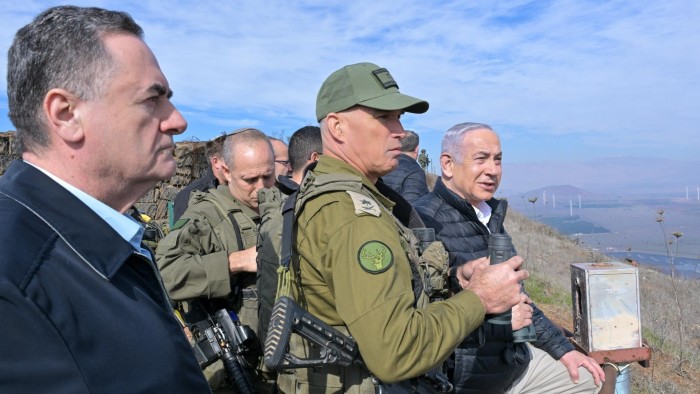 Israeli Prime Minister Benjamin Netanyahu, right, and defence minister Israel Katz, left, in the Israeli-occupied Golan Heights on Sunday