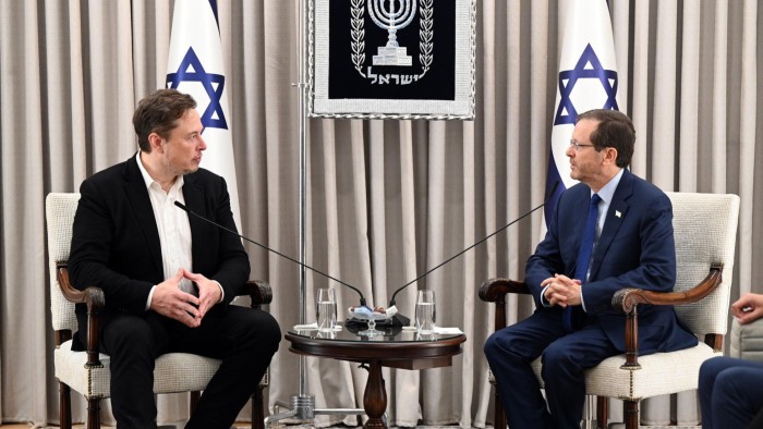 Elon Musk attends a meeting with Israeli President Isaac Herzog in November 2023 in Jerusalem, Israel