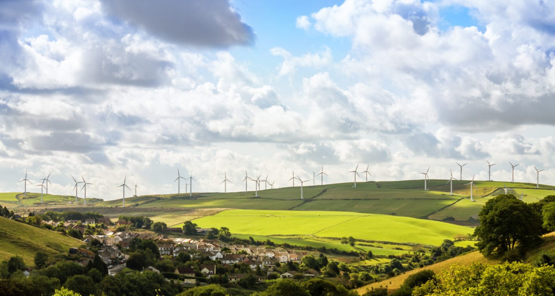 Long range view of wind turbines in the countryside
