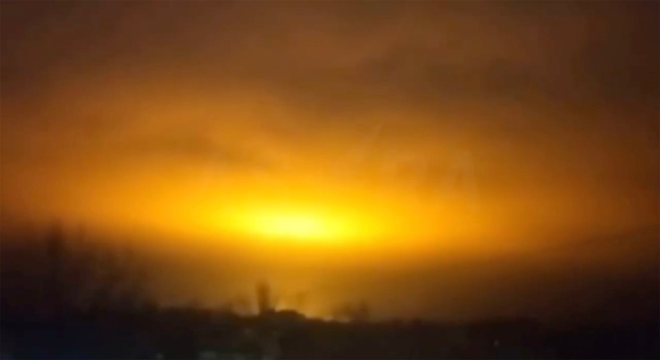 A massive Ukrainian drone strike on a Russian oil depot sent bright orange sparks flying through the night sky